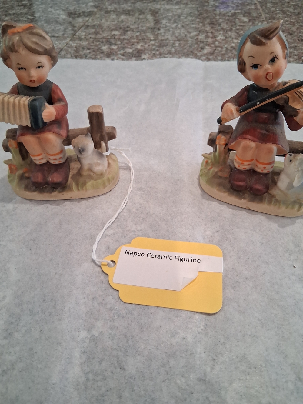 Hummel Ceramic Figurines in Cream, Brown, Blue and Red .Set